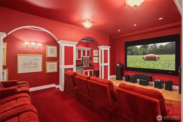 A lower level theatre and full bedroom for guests and entertaining