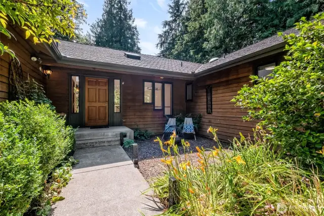 Tucked away down a quiet gravel drive shared by just one other home, this exceptional custom-built residence offers nearly 3,700 square feet of living space and sits proudly on a serene 5.4-acre parcel in the picturesque Hobart community.