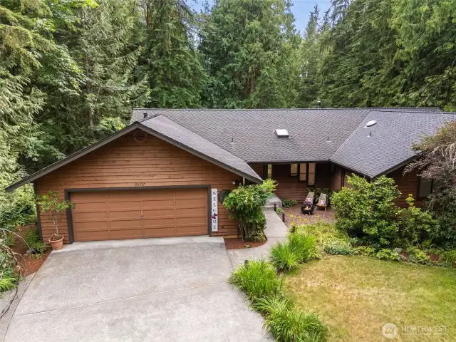 Custom built in 1990 and thoughtfully designed for flexibility, privacy, and natural beauty, this home is the perfect blend of comfort, functionality, and opportunity—ideal for multigenerational living, remote work, or simply escaping the hustle and bustle while staying close to modern conveniences.