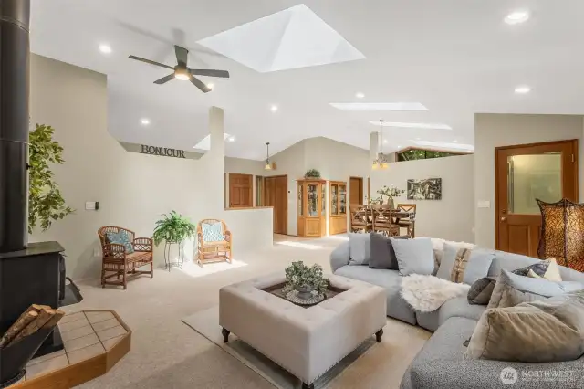 The home is heated by an efficient 4-zone radiant system throughout, offering consistent comfort in every season. There's also a whole-house fan to keep things cool during the warmer months. The attached two-car oversized garage features natural light from its windows and is thoughtfully positioned right off the kitchen for convenient grocery unloading. It also includes ample built-in storage, making it both practical and spacious.