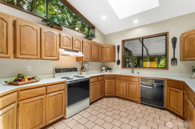 Already equipped with a point-of-use water heater under the sink, this kitchen holds significant potential for transformation.