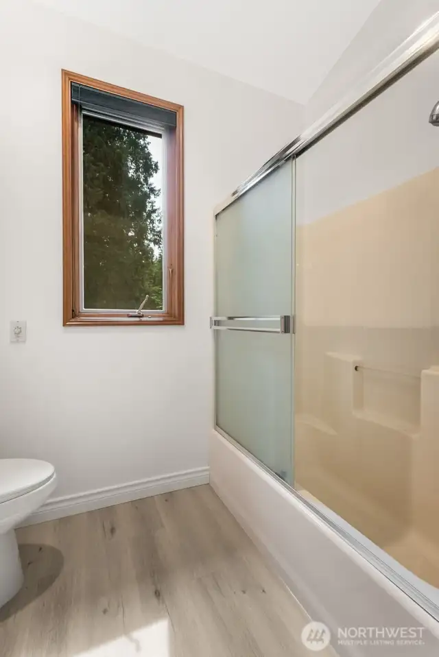 Two separate spaces in this primary bathroom - the layout you want, pick your finishes! New flooring!