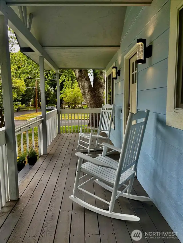 Rocking chair front porch perfect for coffee, friends, a good book or to simply enjoy a day in the neighborhood.