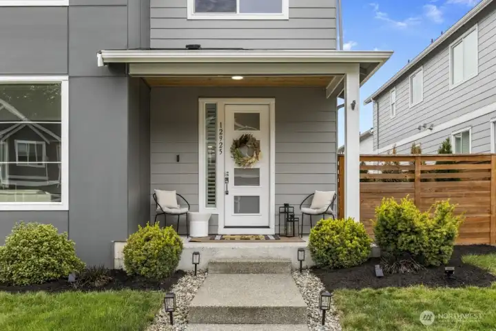 This contemporary two-story will impress from first step.