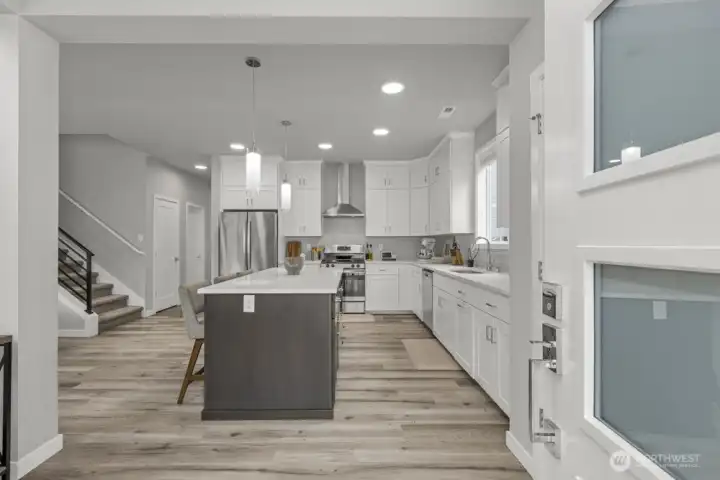 An open floor plan that maximizes light, connection, and flexibility—creating a space that feels both welcoming and versatile.