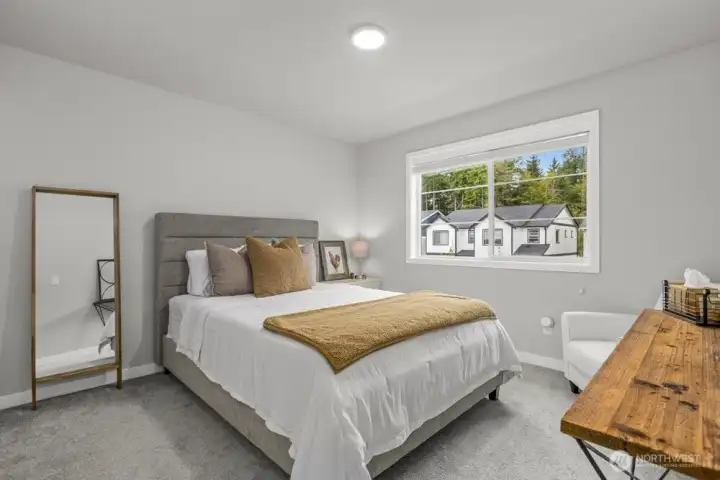 Roomy bedroom #2 is located right off of the loft flex space.
