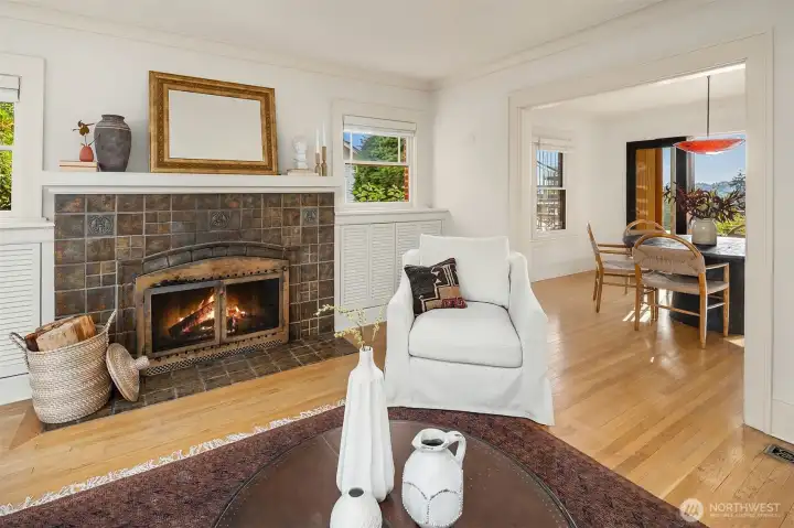 Original tiled fireplace adds character and a cozy place to relax.