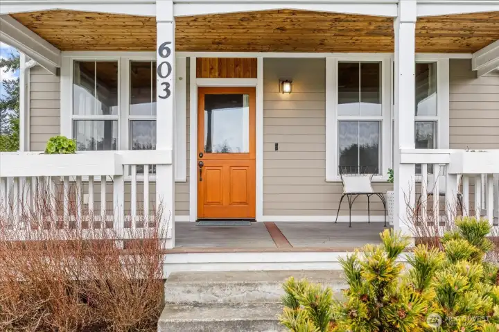 Spacious covered front porch faces west, watch beautiful sunsets every night.