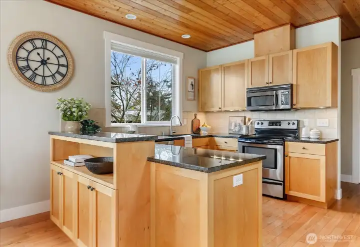 Classic kitchen layout with sink at the window.