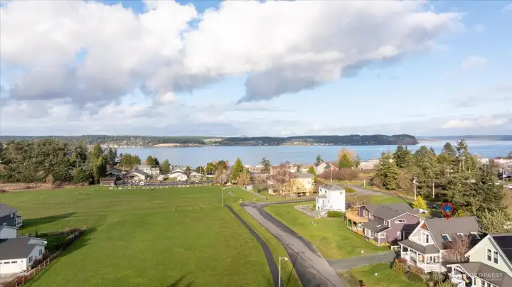 Library is just on the right of the village green, so close!