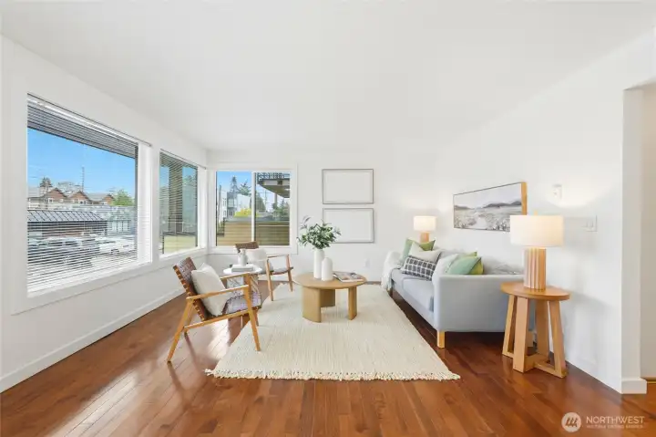 Located on the main floor of a well-maintained complex, this inviting home features a cozy open layout with a warm wood-burning fireplace, an eat-in kitchen, and abundant natural light.