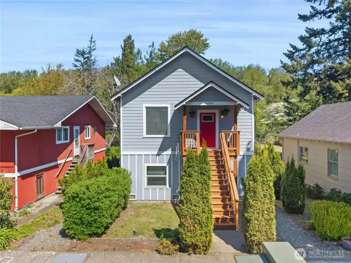 2 bedroom 1 bath with unfinished downstairs w/ possible retail use