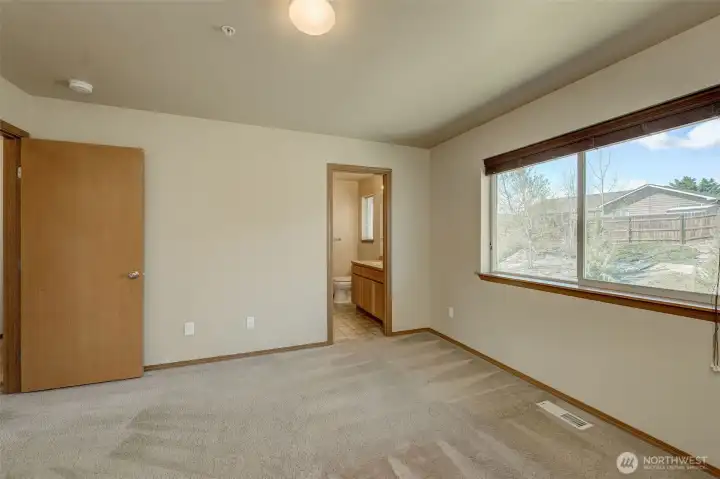Primary bedroom with bath