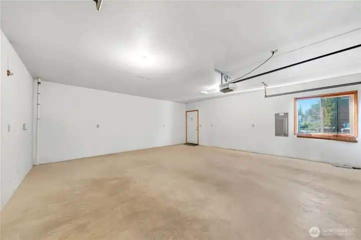 Big garage with double door garage remote opener.