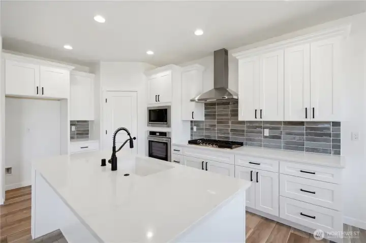 Quartz countertops and high end soft-close cabinetry