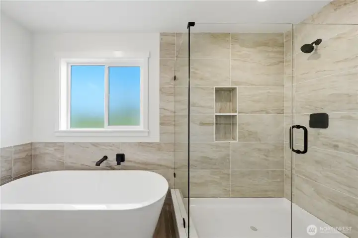 Freestanding tub and shower with tile surround