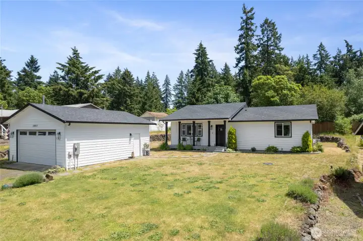 to this adorable Craftsman Cottage!