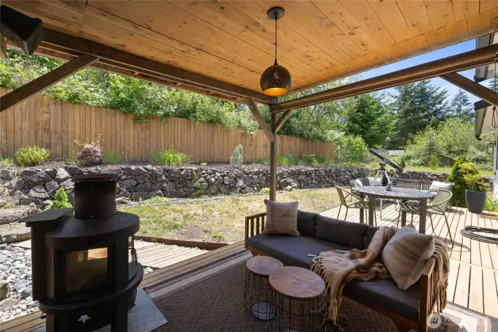 A covered porch provides cover from our wet winters while staying warm by the fire.