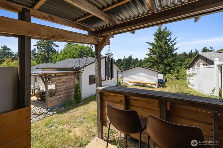 which houses an outdoor kitchen perfect for cooking up the fish you catch in the stocked lake!