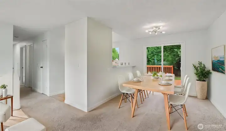 Good-sized dining room, with convenient access to the backyard deck. Virtually staged. Good-sized dining room, with convenient access to the backyard deck. Virtually staged.