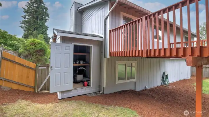 Shed (aka "out building") on side of house is not part of the actual structure of the house. Shed (aka "out building") on side of house is not part of the actual structure of the house.