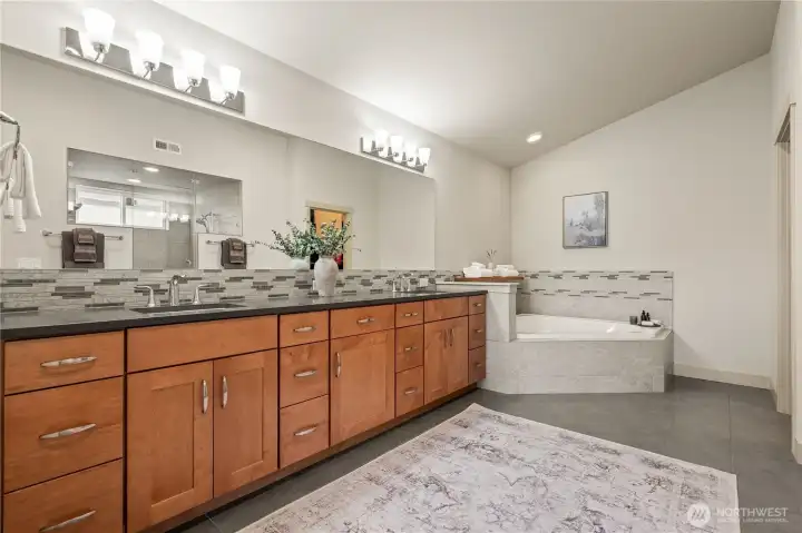 Dual vanity sink and large soaking tub in the large primary bath. Dual vanity sink and large soaking tub in the large primary bath.