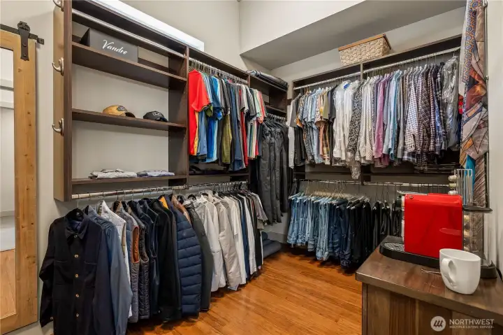 One of two main bedroom off-suite walk-in closets One of two main bedroom off-suite walk-in closets