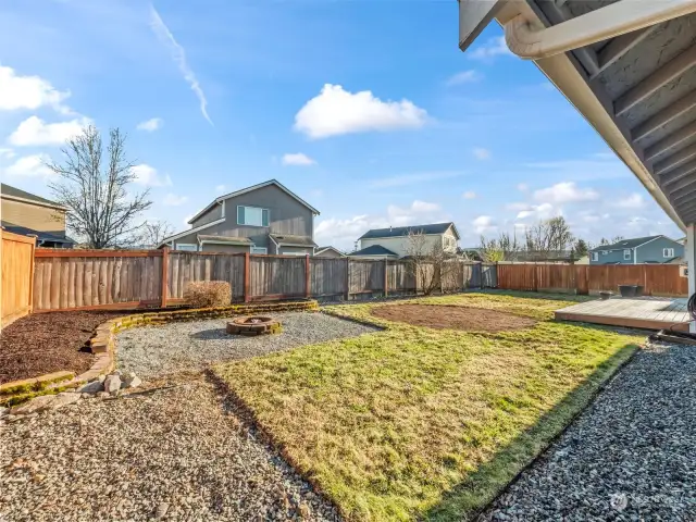 Backyard is fully fenced and perfect for gathering with family and pets.