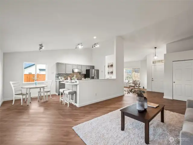 A view from the living area to kitchen.  Look at the beautiful floors!