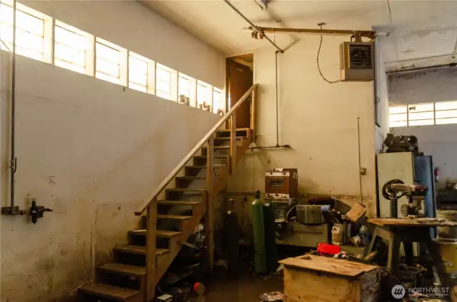 Upstairs to small office area in shop
