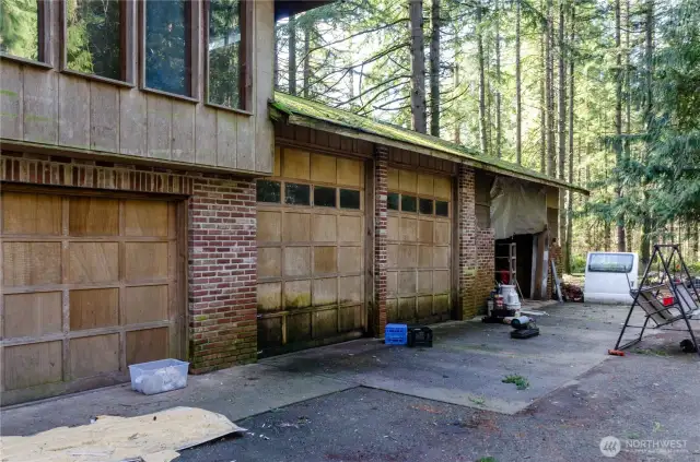 4 garage bays, 3 are attached to house