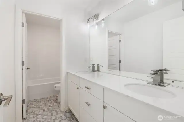 Secondary Bathroom with upgraded plumbing and electrical features