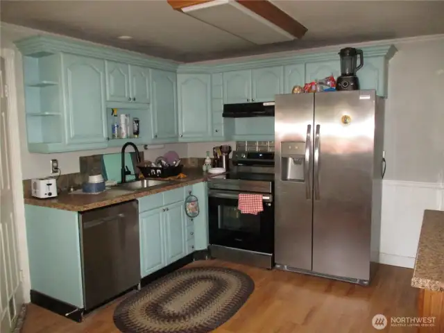 Large kitchen with eating area.