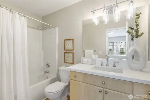 Updated Bath, New LVP Flooring, Countertop, Updated Fixtures, and Warm Lighting