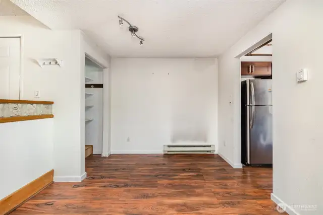 Dining room is conveniently situated between the living room and kitchen, creating a seamless flow for everyday living and entertaining.