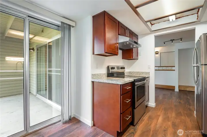 Additional access to the back patio from the kitchen makes outdoor dining and entertaining a breeze.