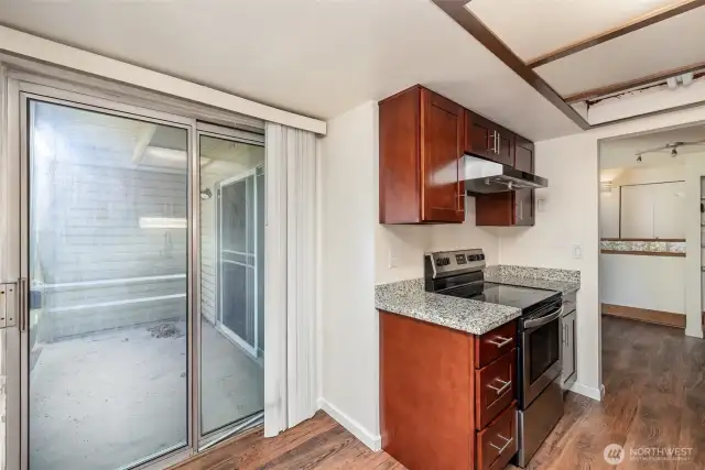 Additional access to the back patio from the kitchen makes outdoor dining and entertaining a breeze.