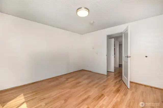 Another view of the primary bedroom.