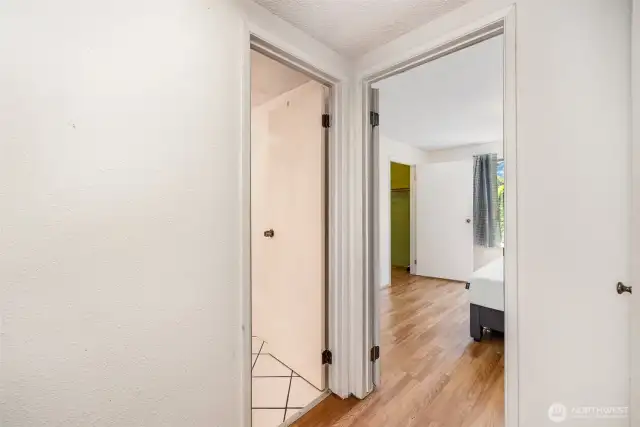 View from the hallway of the bedroom & bathroom.