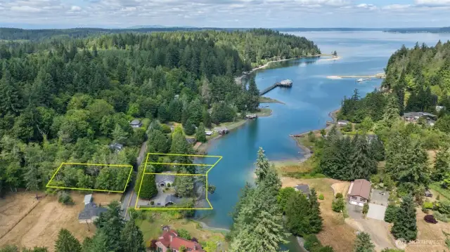 Mayo Cove is a sight to see.  4 parcels totaling 2.5 acres.  Septic on other side of street, and two vacant parcels to the north of main home.