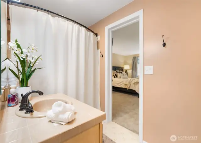 Walk through bathroom from 2nd bedroom or from hallway.