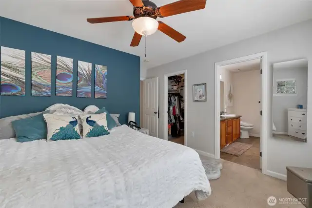 Walk-in closet in the primary bedroom separate from the bathroom