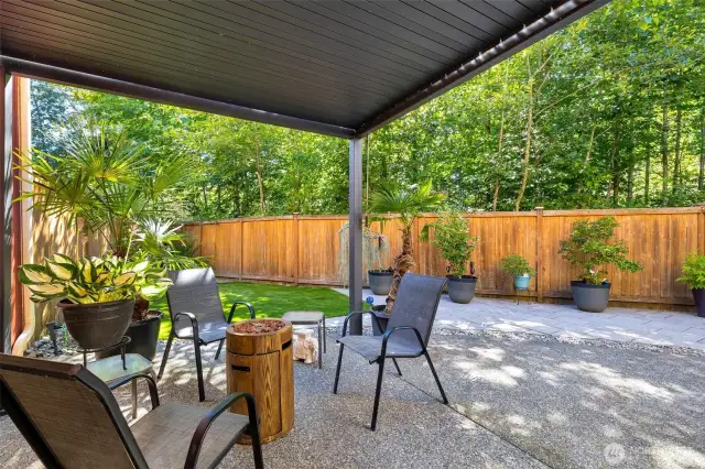The backyard is a private oasis overlooking a greenbelt