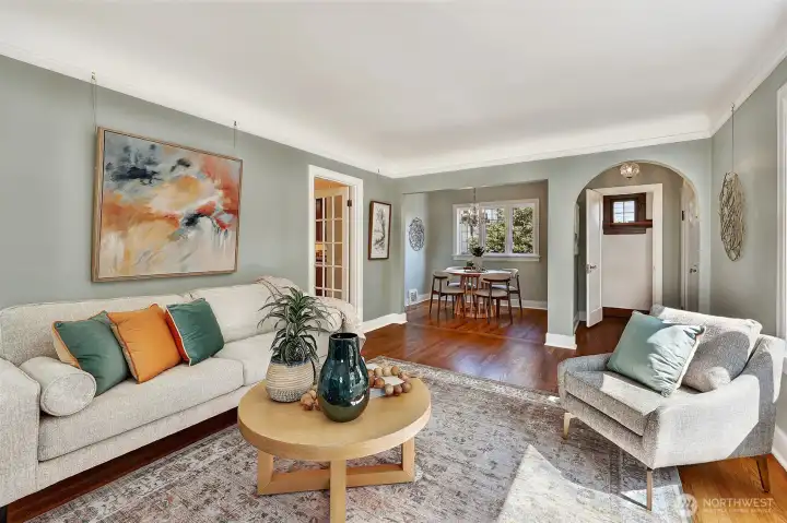 In front of fireplace looking to dining area.