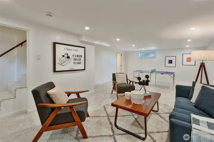 Lower level rec room is cheery and bright.