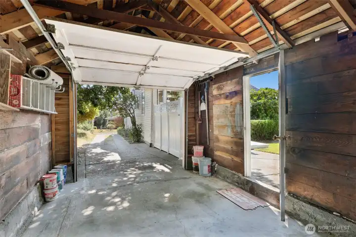 221 Square feet detached garage with long driveway for off-street parking options.