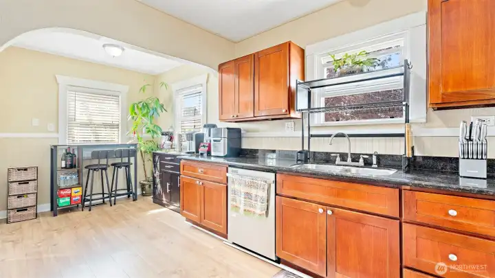 Spacious Kitchen + Study or coffee nook with entrance to backyard patio and finished lower level.