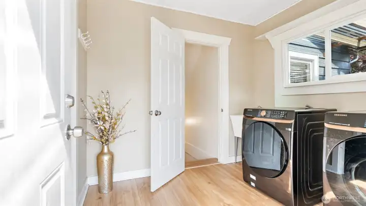 Utilities + Entrance to lower level living (Main)