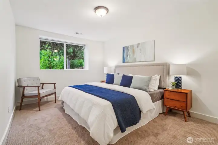 This fourth bedroom on the lower level is perfect to give guests their own separate, private space.