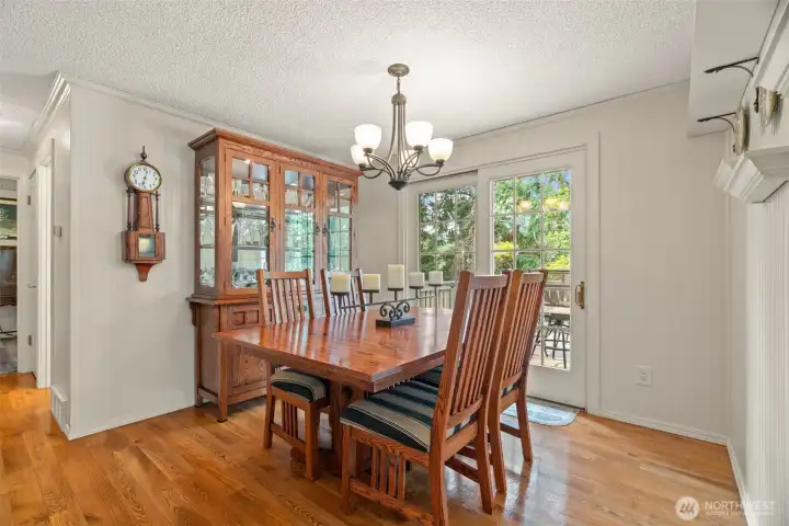 Dining room with doors that open to the entertainment sized rear deck.